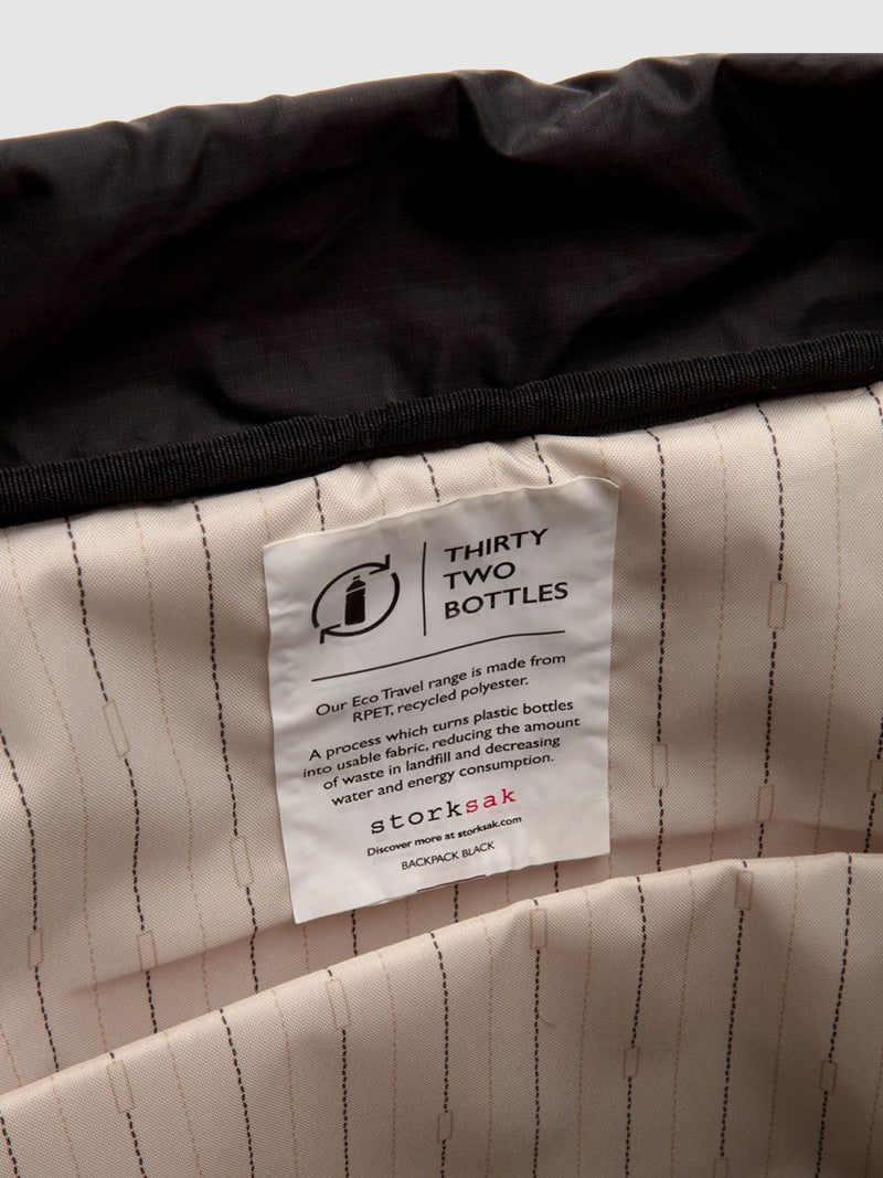 storksak travel eco backpack black, changing bag rucksack, recycled material, made from 32 plastic bottles